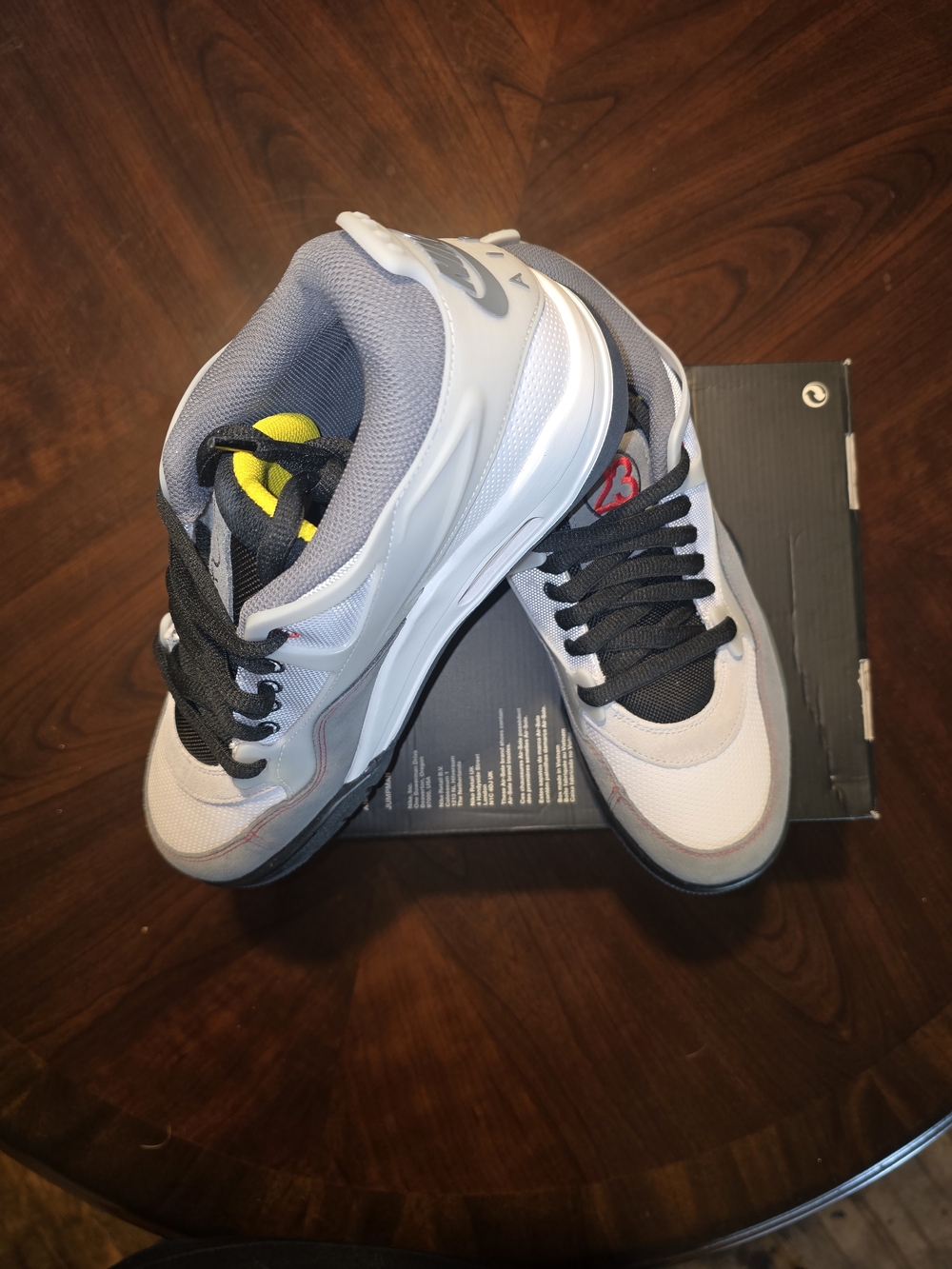 Jordan Men's Gray and Black Sneakers with Yellow Tongue Accent
